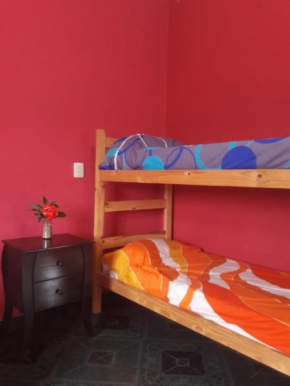 Habitación y pileta Los Alisos